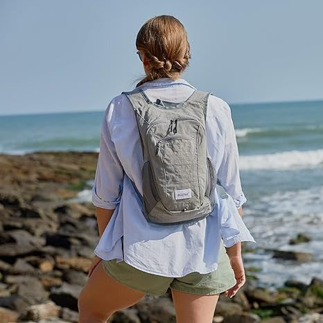 a girl with a Foldable Shoulder Bag near the sea