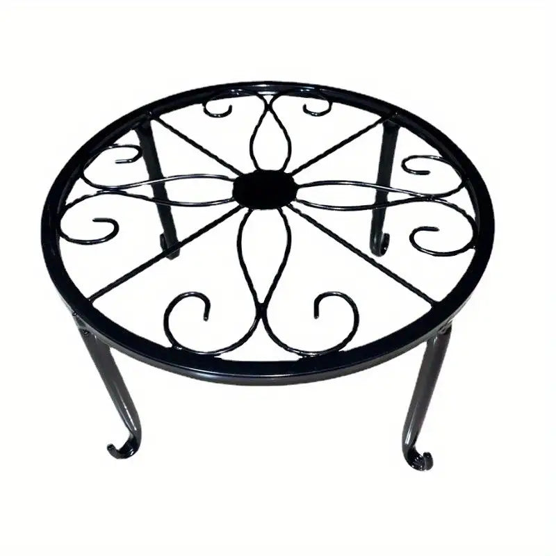 a balck metal plant stand