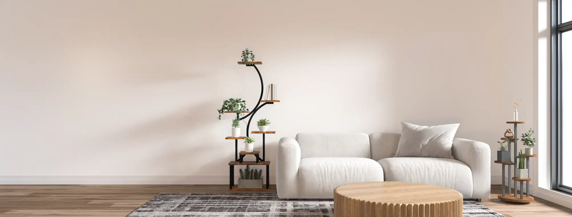 A stylish living room featuring a white sofa, a wooden coffee table, and two modern plant stands holding various green plants. The larger plant stand has a unique curved design with multiple shelves, while the smaller one has a round base with tiered shelves. The room is bright with natural light coming through a large window on the right, complementing the minimalist decor and cozy ambiance.